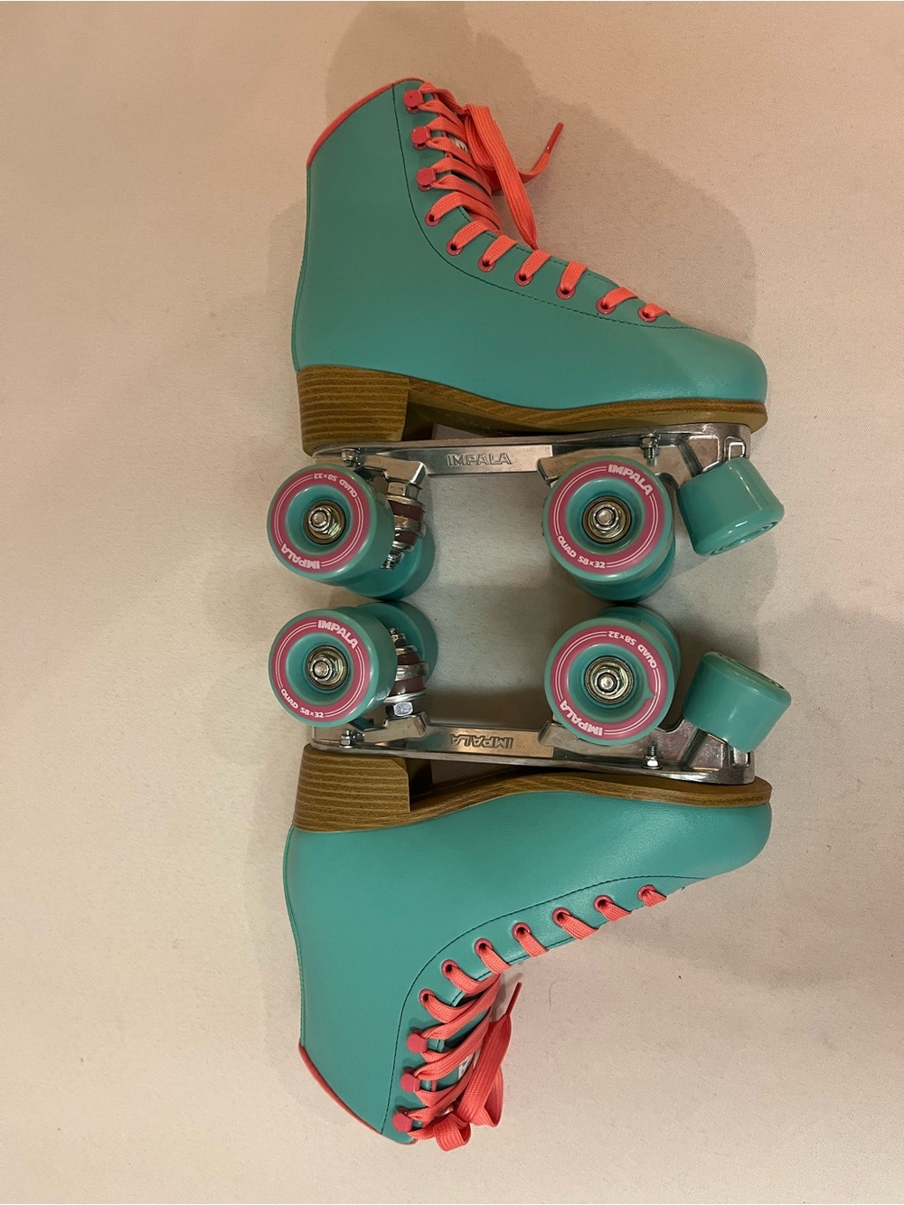 6 - Teal and Pink Quad Roller Skates by Impala - like new